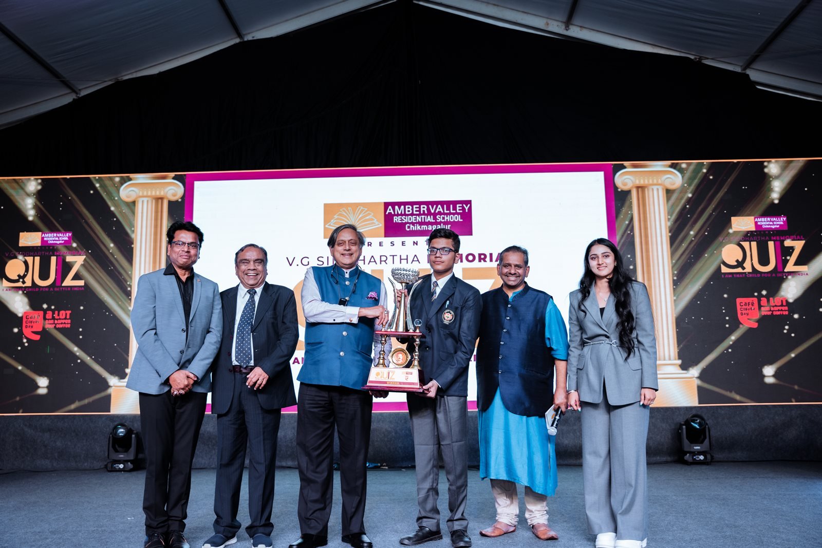 Dr. Shashi Tharoor presenting the VGS Memorial rolling trophy to the champion